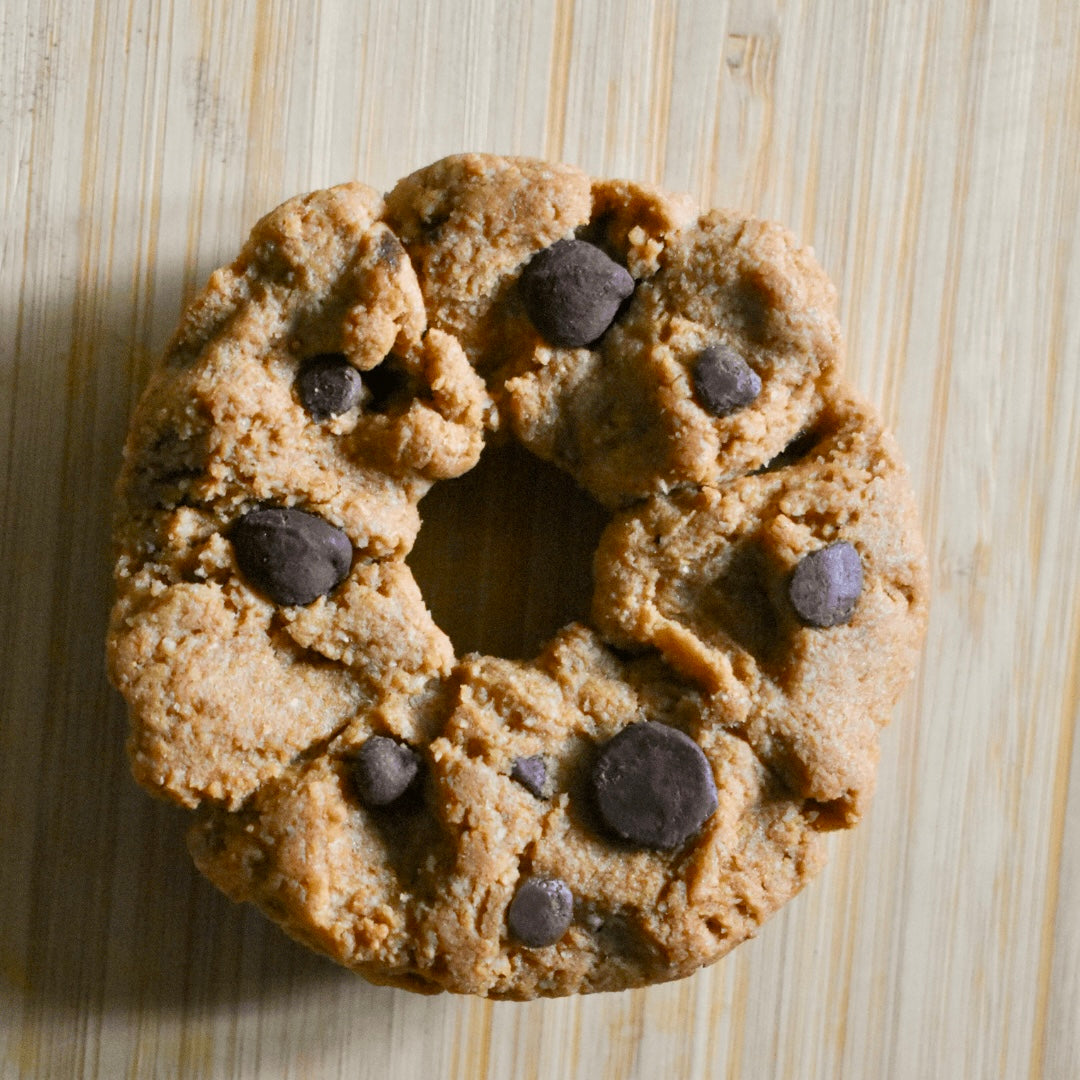 Classic Chocolate Chip- but make it vegan! (Yasss Please!!)

Topped and hand rolled with Enjoy Life Chocolate Chips 11g of Protein  (Vegan/Plant Based)

Gluten Free, Vegan & 12g of protein cookie-donut hybrid

Free Friday Deliveries across the Omaha metro and 14.95 shipping across the U.S. 